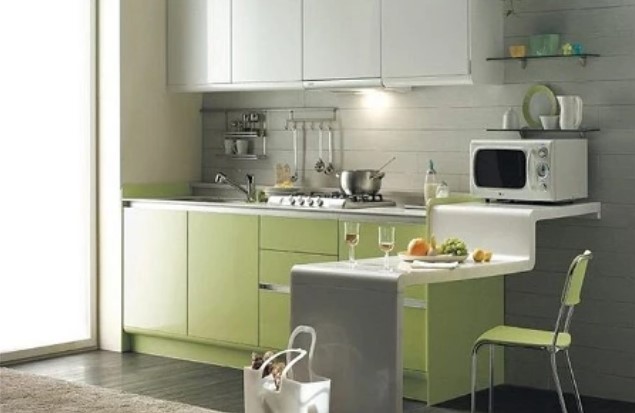 Dapur sederhana dan rapi dengan nuansa berwarna Hijau